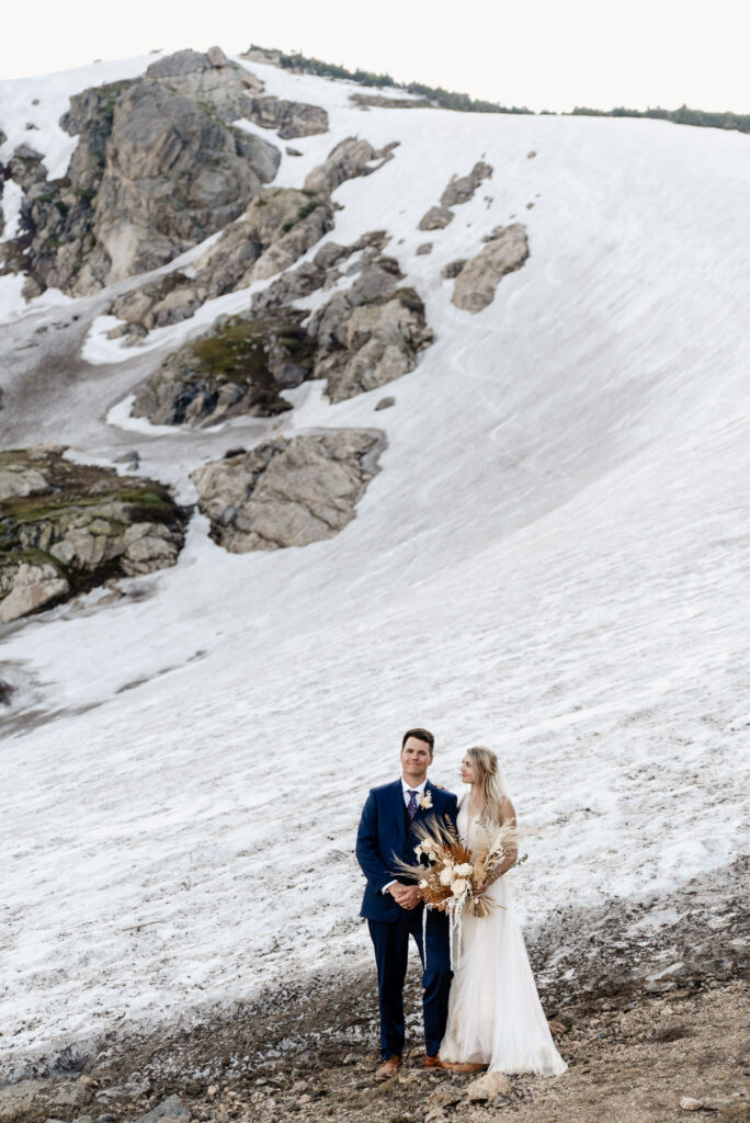 Bride and groom eloping in the mountains of Colorado